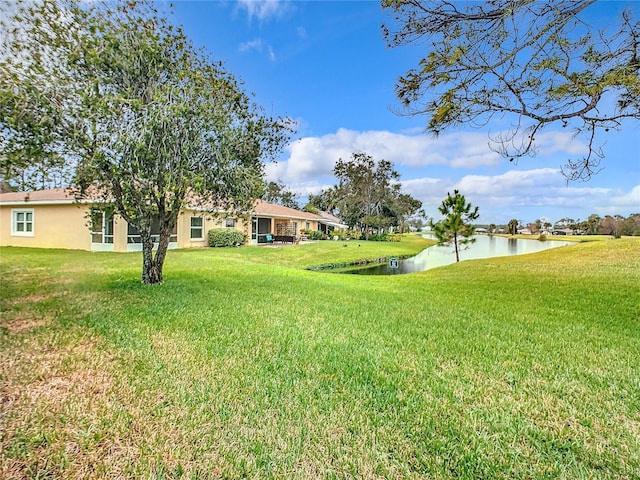 view of yard with a water view