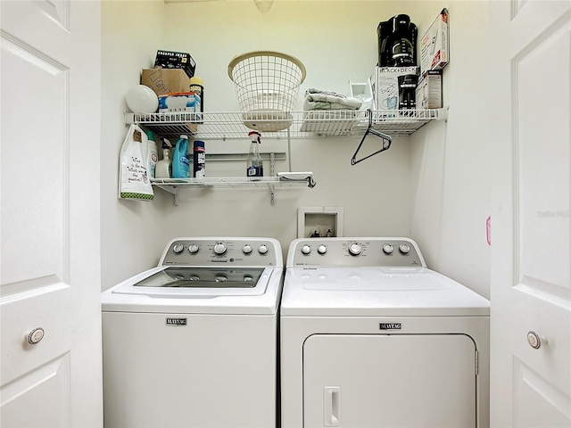 washroom with separate washer and dryer