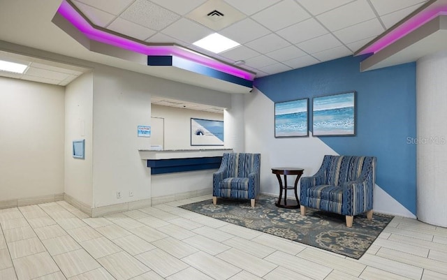 2700 N Atlantic Ave Unit 423, Daytona Beach, FL 32118 - living area featuring a paneled ceiling
