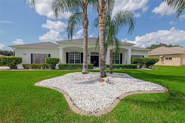 view of front facade with a front lawn