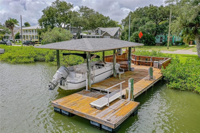 view of dock with a water view