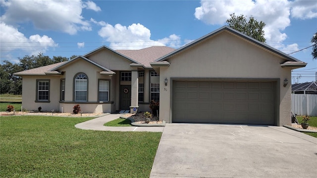 ranch-style house with a front yard and a garage