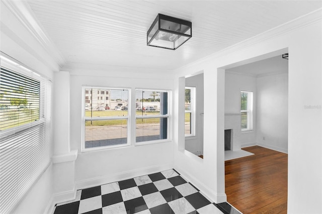 unfurnished sunroom featuring plenty of natural light