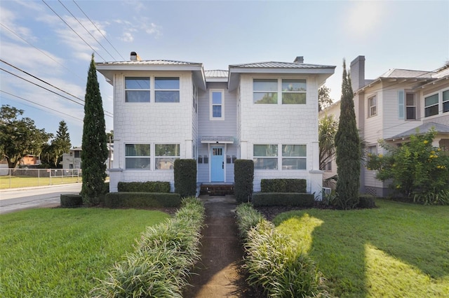 view of front of property with a front yard