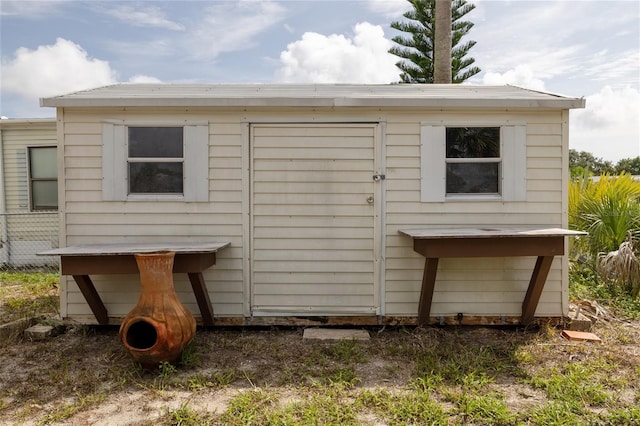 exterior space with a shed