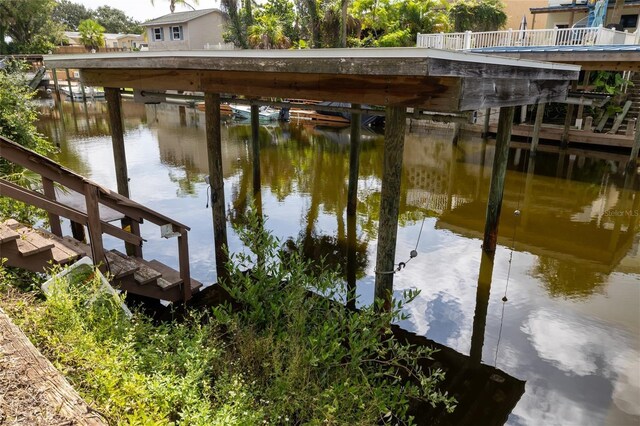 dock area with a water view