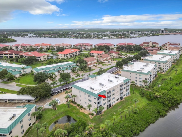 drone / aerial view featuring a water view