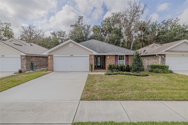 ranch-style house with a garage and a front lawn