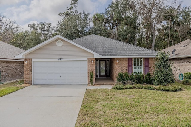 ranch-style house with a garage and a front lawn