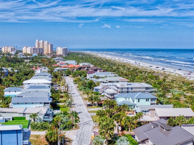 aerial view featuring a water view and a view of the beach