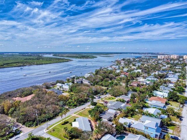 bird's eye view with a water view