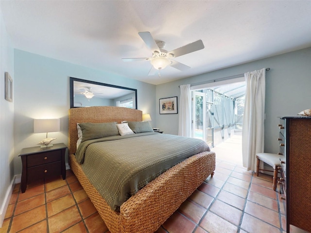 bedroom with ceiling fan, tile patterned floors, and access to exterior