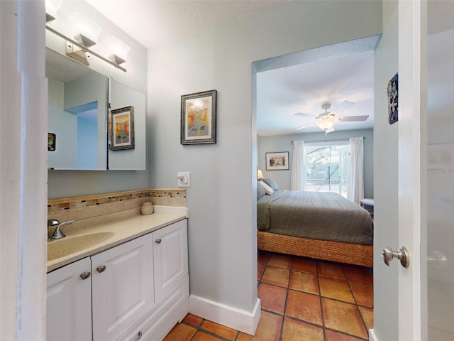 bathroom with vanity, tile patterned flooring, and ceiling fan