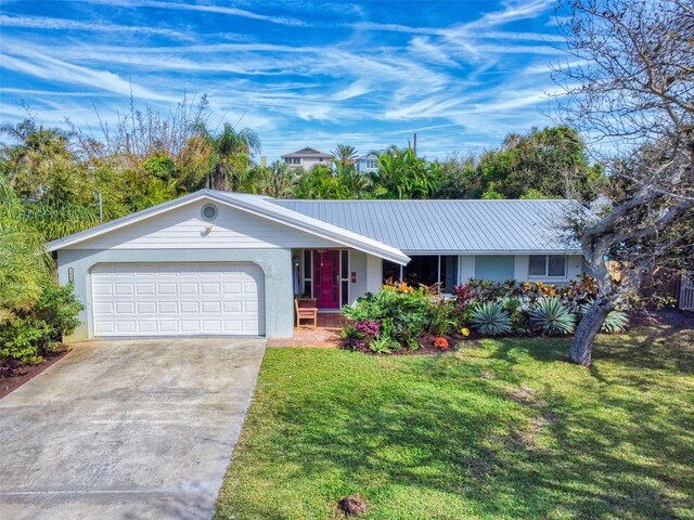 single story home with a garage and a front lawn