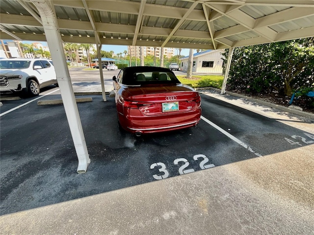 view of parking with a carport