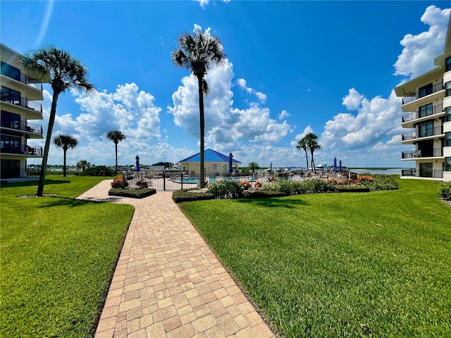 view of community featuring a yard