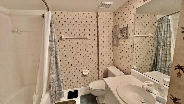 full bathroom featuring shower / tub combo, vanity, tile patterned flooring, and toilet