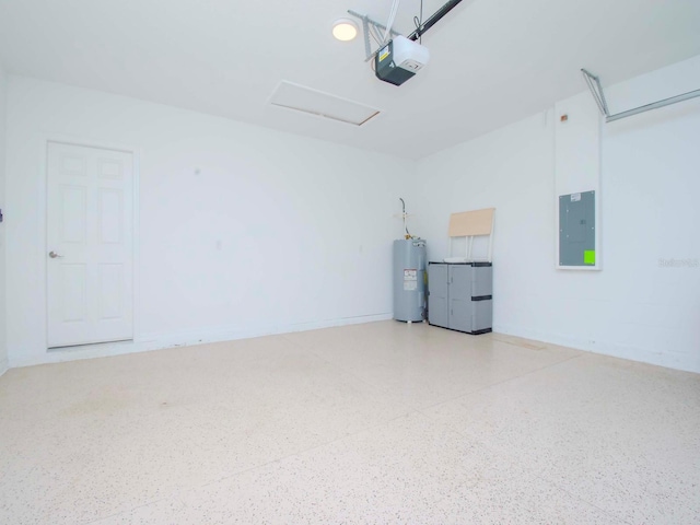 garage featuring a garage door opener, water heater, and electric panel