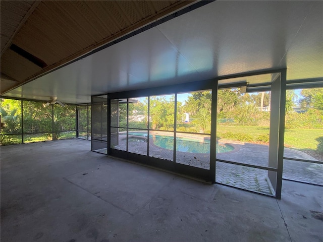 unfurnished sunroom with a healthy amount of sunlight