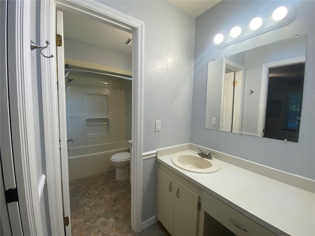 full bathroom with shower / tub combination, a textured ceiling, vanity, and toilet