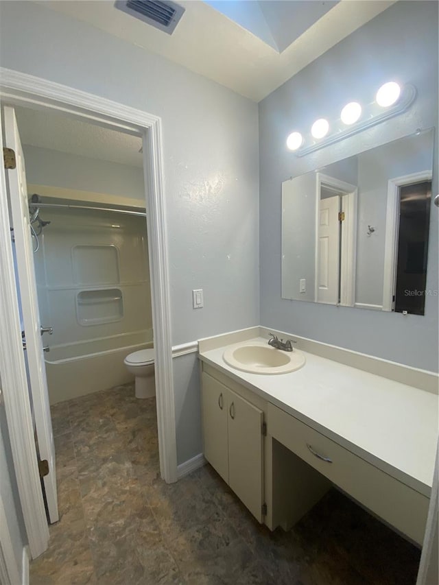 full bathroom with vanity, toilet, and shower / bathtub combination