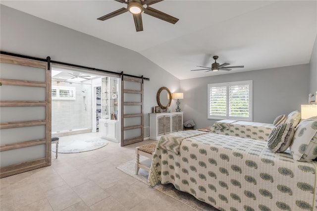 bedroom with a barn door, connected bathroom, and ceiling fan