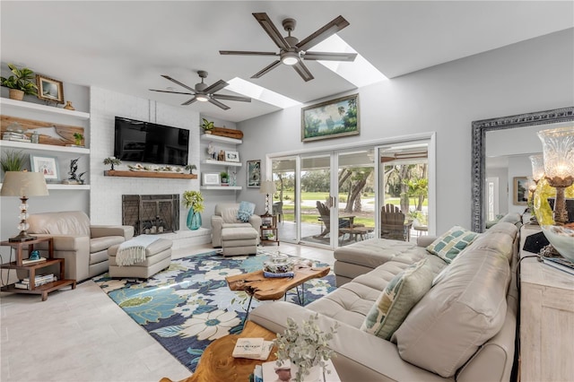 tiled living room featuring a brick fireplace and ceiling fan