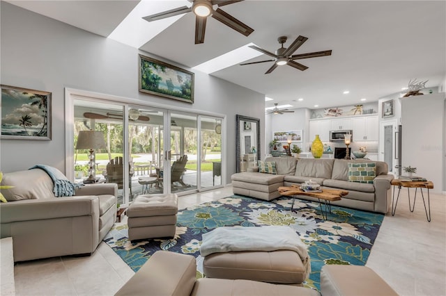 living room with ceiling fan and light tile patterned floors