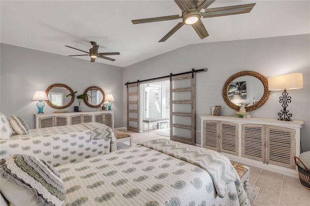 tiled bedroom featuring a barn door, lofted ceiling, and ceiling fan