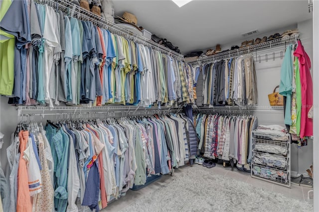 spacious closet featuring tile patterned floors