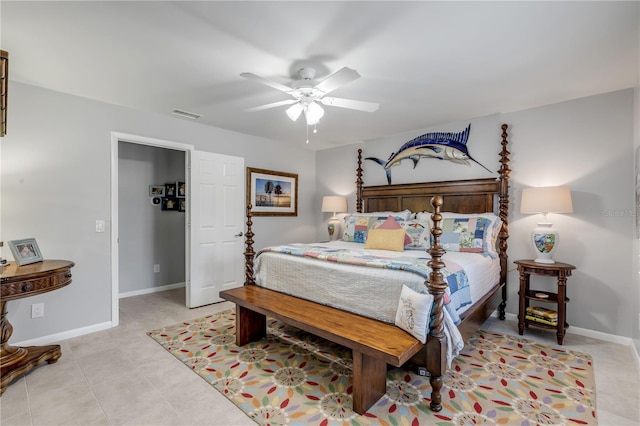 tiled bedroom with ceiling fan