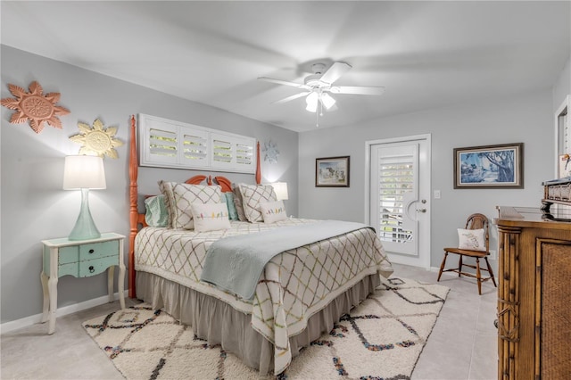 tiled bedroom with ceiling fan and access to exterior