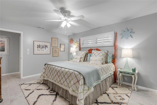 bedroom featuring ceiling fan and light tile patterned flooring