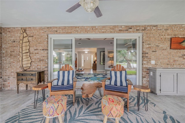 view of patio featuring ceiling fan