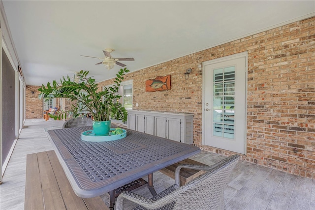 exterior space featuring ceiling fan