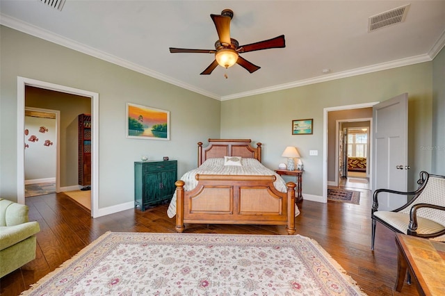 bedroom with ornamental molding, dark hardwood / wood-style flooring, and ceiling fan