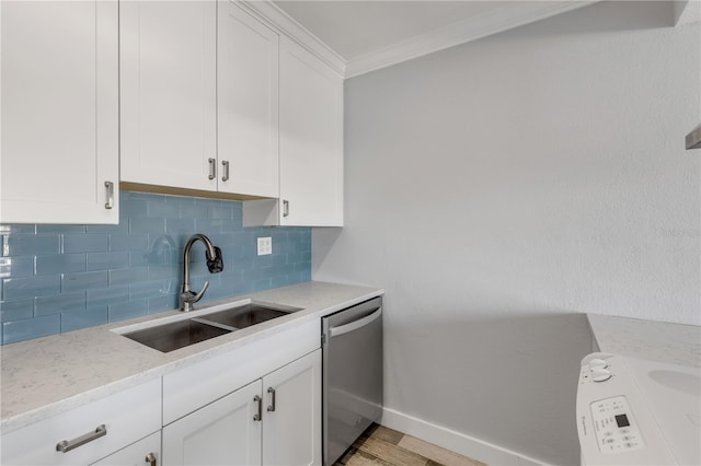 kitchen featuring light stone counters, white cabinets, dishwasher, light wood-type flooring, and sink