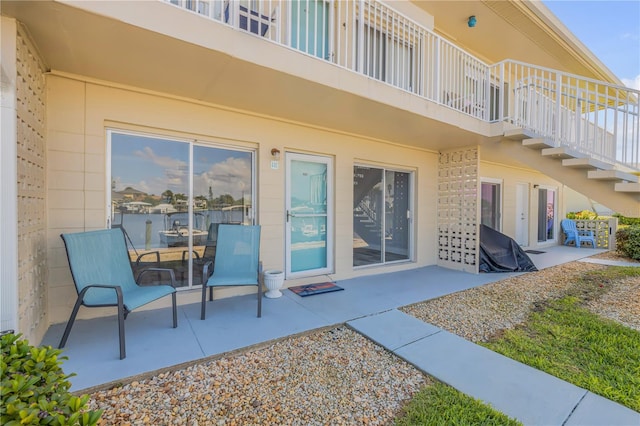 exterior space with a balcony and a patio area