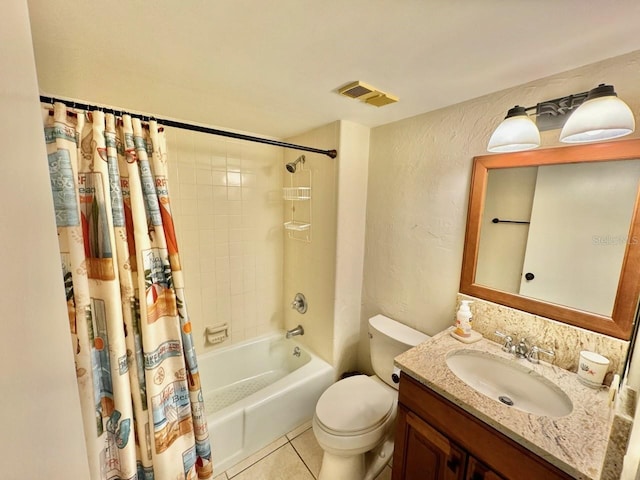 full bathroom featuring shower / bath combination with curtain, vanity, toilet, and tile patterned floors