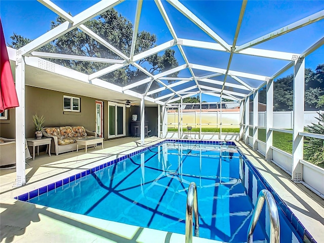 view of pool featuring a lanai and a patio