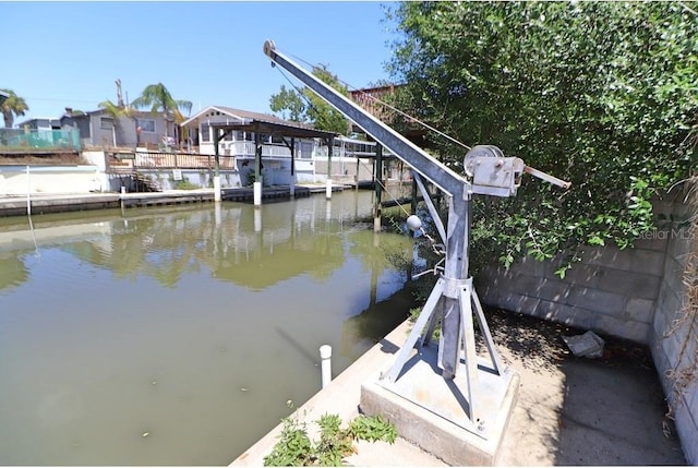 dock area with a water view