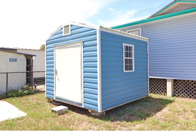 view of outdoor structure with a yard