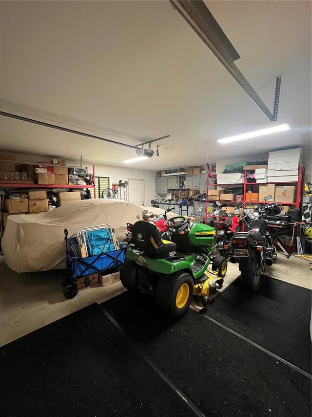 garage featuring a garage door opener