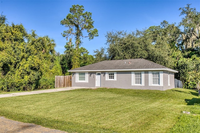 ranch-style home with a front yard