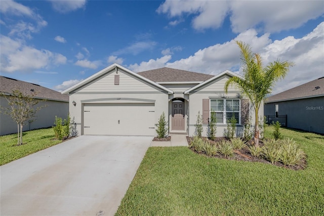 ranch-style home with a garage and a front lawn