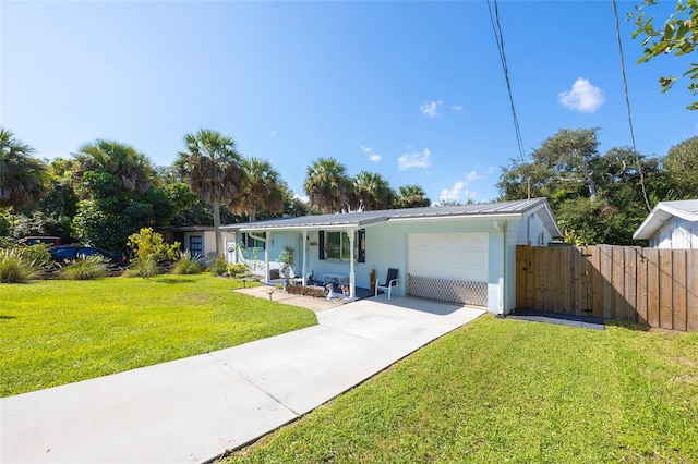 single story home featuring a front yard and a garage