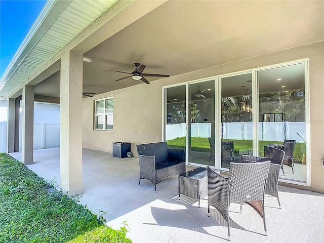 view of patio with ceiling fan