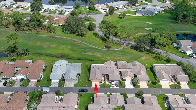 11 Andrea Dr, New Smyrna Beach, FL 32168 - aerial view of property's location featuring nearby suburban area, a golf club, and a large body of water