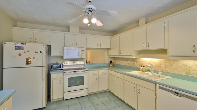 kitchen with white appliances, sink, ceiling fan, decorative backsplash, and light tile patterned flooring