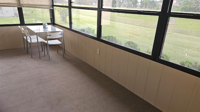 unfurnished sunroom with plenty of natural light